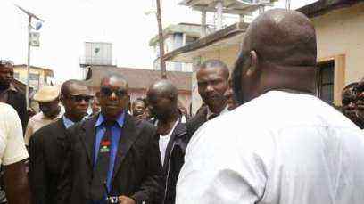 An aide of Uwazuruike with a Biafran flag on his tie