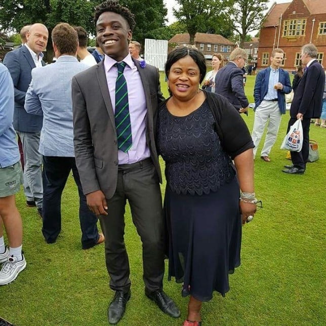 KWAM 1's son, Ademola and his mother.