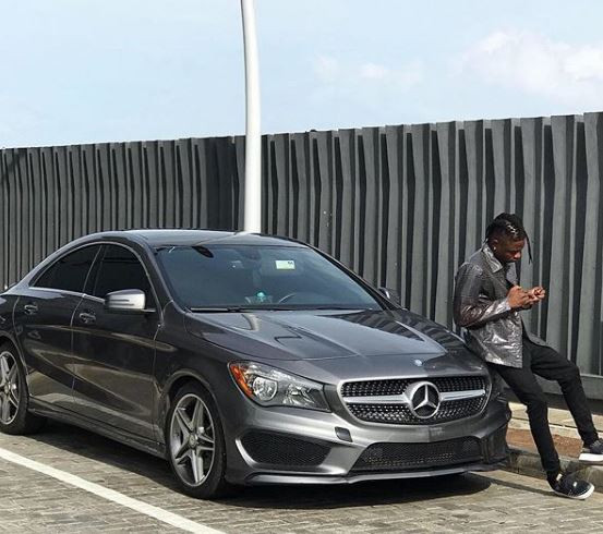 Photos: Lil Kesh shows off his brand new Mercedes Benz whip (Photos)
