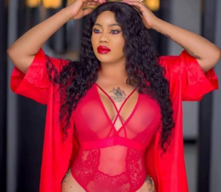 Image result for Mother of two, Toyin Lawani shows off amazing body in skimpy transparent red lingerie
