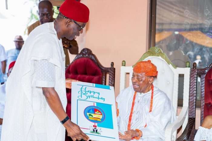 Gov Ifeanyi Okowa presenting a birthday card to the Asagba of Asaba on his 95th birthday